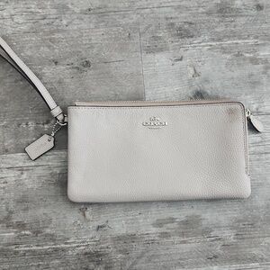 Coach Pebbled Leather Wristlet Clutch in Beige